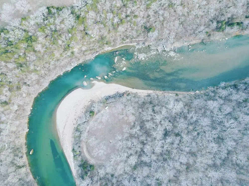 A river with lots of water on it's side.