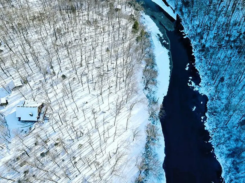 A view of the river and its banks from above.