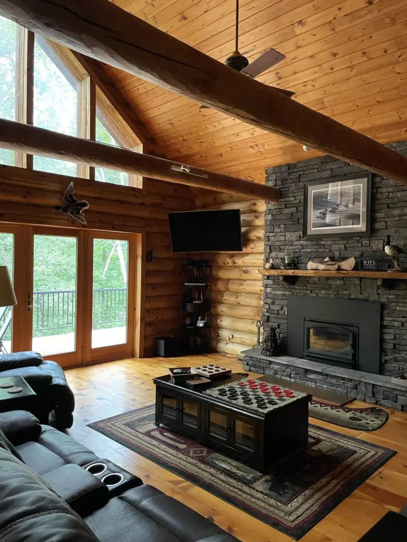 A living room with a fireplace and a couch